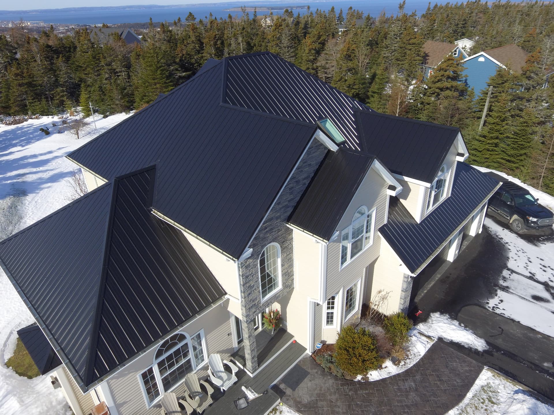 Close-up drone detail of architectural batten ribs and dormers